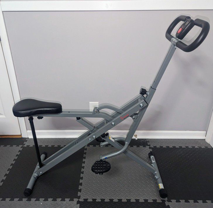 Sunny Health & Fitness Squat Assist Row-N-Ride™ Trainer for Glutes Workout

