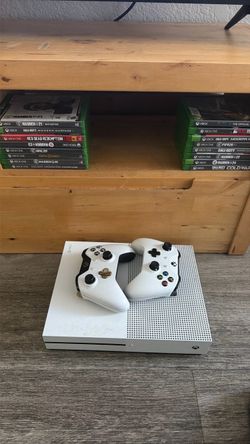 X one / games / 2 controllers / HDMI cord, console plug as well