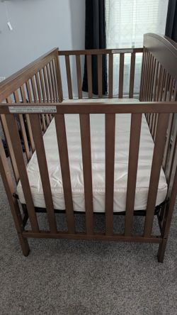 Baby crib with mattress