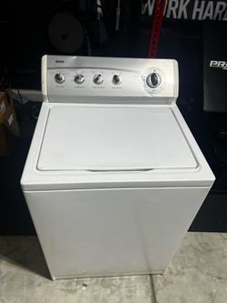 Kenmore old school top load washing machine.
