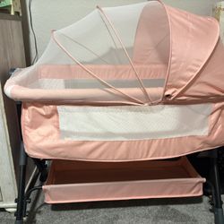 Pink And White Bassinet