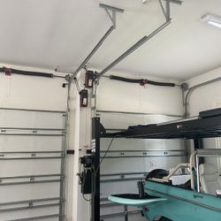 Overhead Garage Door Spring Opener Off Track Adjustment Replace and Parts