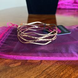 A Narrow ESCAPADE Gold Bracelet 