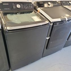 New Samsung Top Load Washer and New Gas Dryer Set in Black Stainless Steel