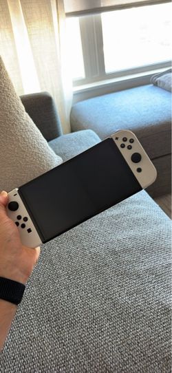 Nintendo Switch OLED with Dock + Mario Kart 8