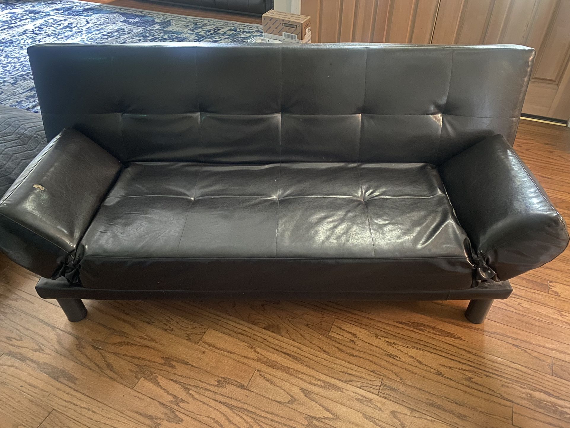 black leather sleeper couch