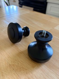 Two black finials