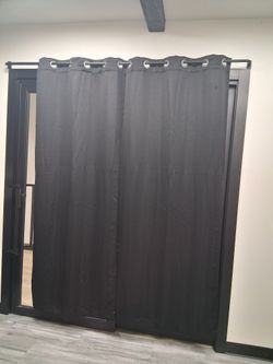 black curtains and curtain rod