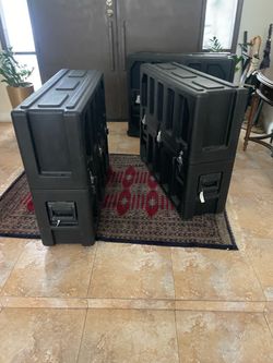 Three SKB storage and transport cases
