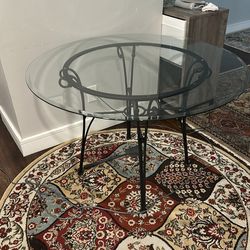 Glass Table and white chairs