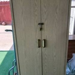 Clothes And Shoe Rack. Also A File Cabinet 