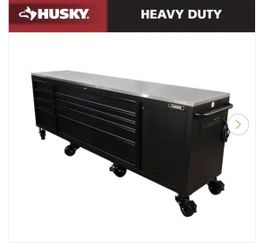 NEW IN BOX Husky 108 in. W x 24 in. D 9-Drawer Heavy-Duty Mobile Workbench with Stainless Steel Top in Matte Black