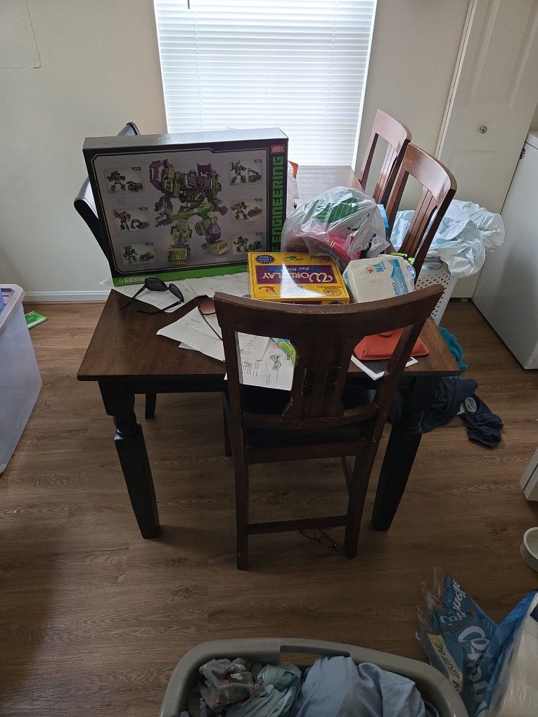 New kitchen table with two new chairs and three very good chairs