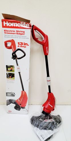 Homelite corded electric string trimmer and edger has a 4 amp motor. This red and black tool features a 13-inch cutting swath and an automatic-feed li