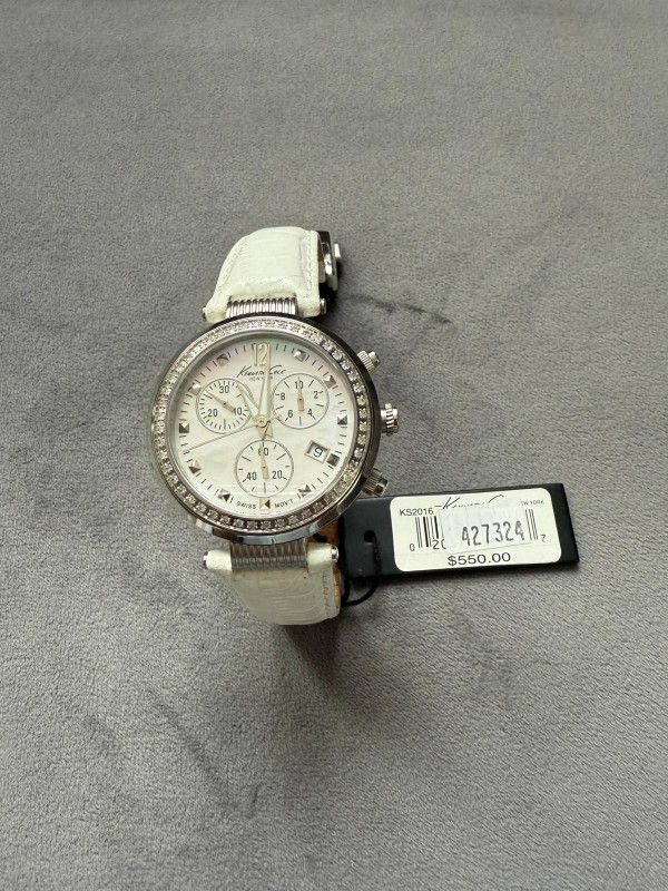 brand new kenneth cole women watch with brand new battery. (MUST SELL TODAY!)