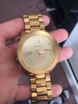 Gold Nixon watch