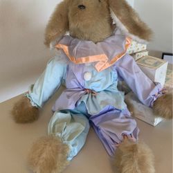 Adorable dog dressed as a clown.