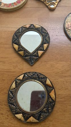 Two decorative mirrors