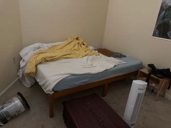 Full sized bed frame with or without mattress.