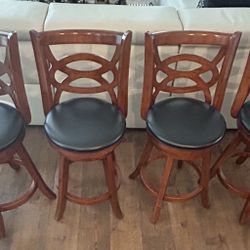 Elegant Wooden Swivel Chairs – Set Of 4