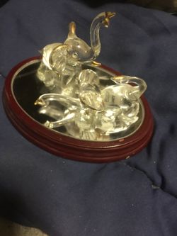 Antique Beautiful two Crystal elephants with gold tips on mirror base