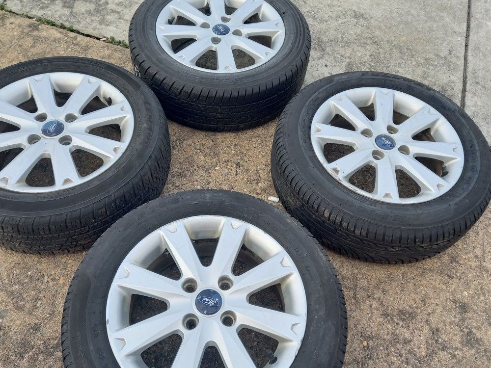 2011-2015 FORD FIESTA 15 INCH RIMS AND TIRES GREAT SHAPE