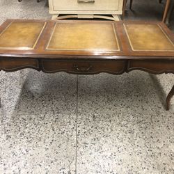 Antique coffee table with Leather inserts