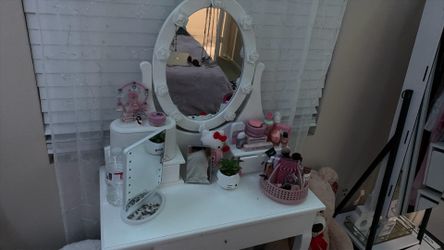 Vanity with a chair