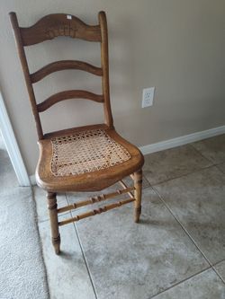 Antique Oak Ladder-Back Chair with Cane Seat