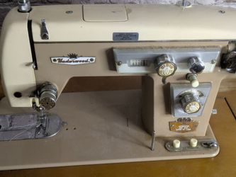 Vintage Underwood Model 134 Automatic Zig Zag Super De Luxe sewing machine, made in Japan, approximately 1960s era.