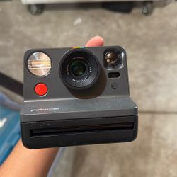 Polaroid Camera W/ A Pack Of Film