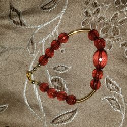 Brownish red and gold bracelet