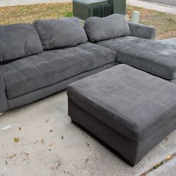 Grey Sectional Couch and Ottoman 