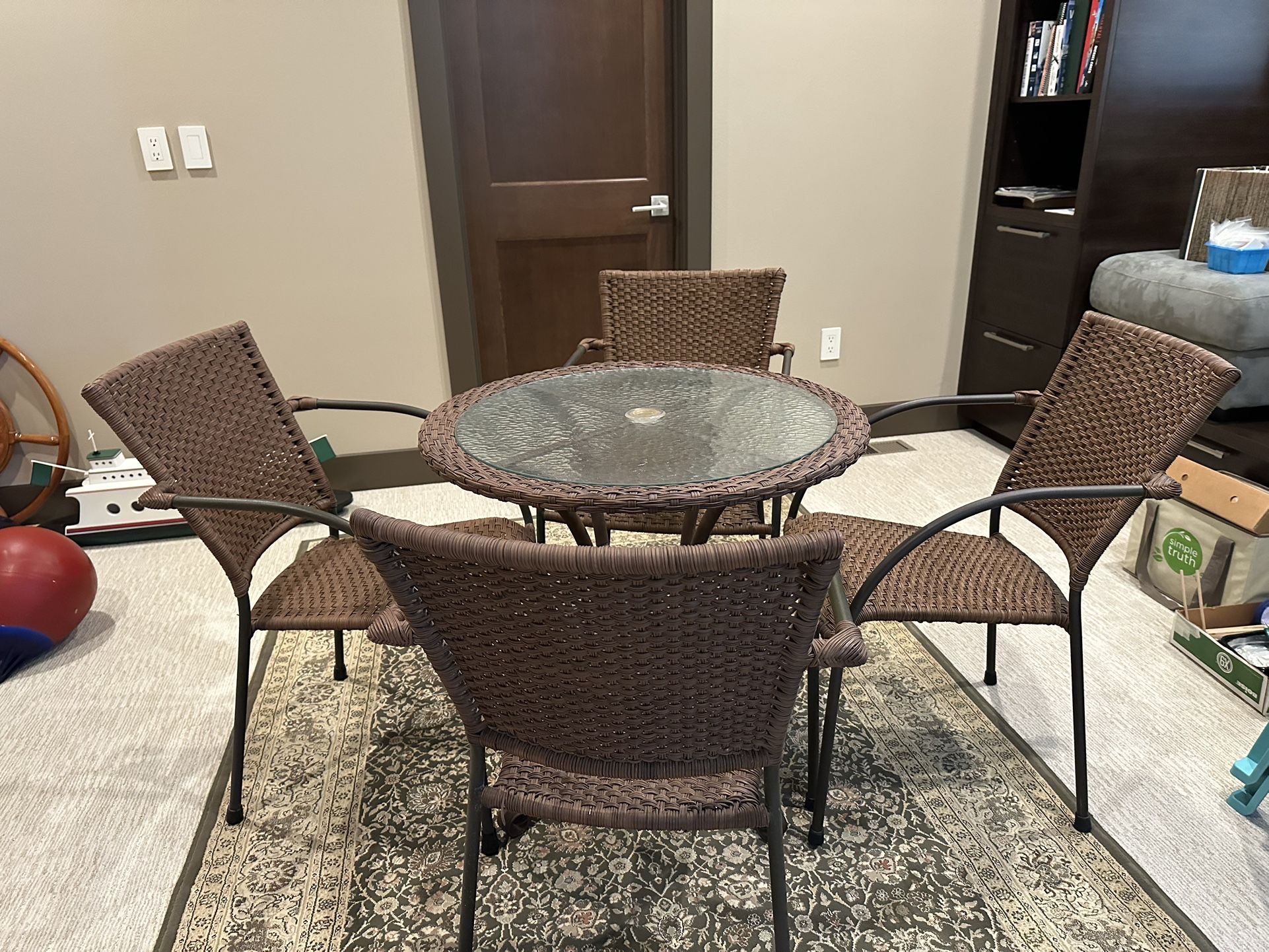 Wicker/Glass Table and 4 chairs