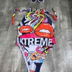 Any bathing suit or bikini with a pair of sun glasses