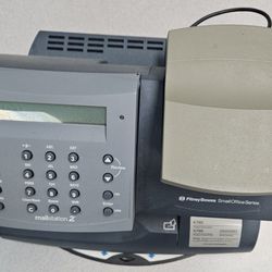 Postage meter with scale