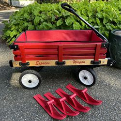 Red Wagon With Wheels And Snow Shoes 