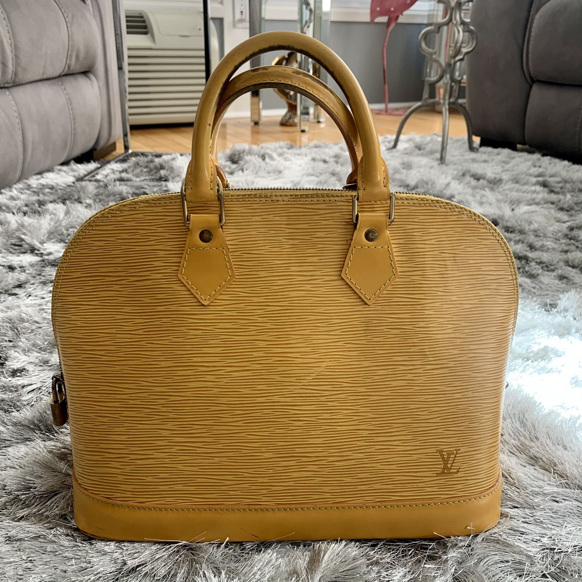Lv Alma Epi Yellow Authentic