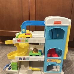 Fisher Price Little People Garage Plus Wheelies 