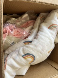 Box of baby girl clothes