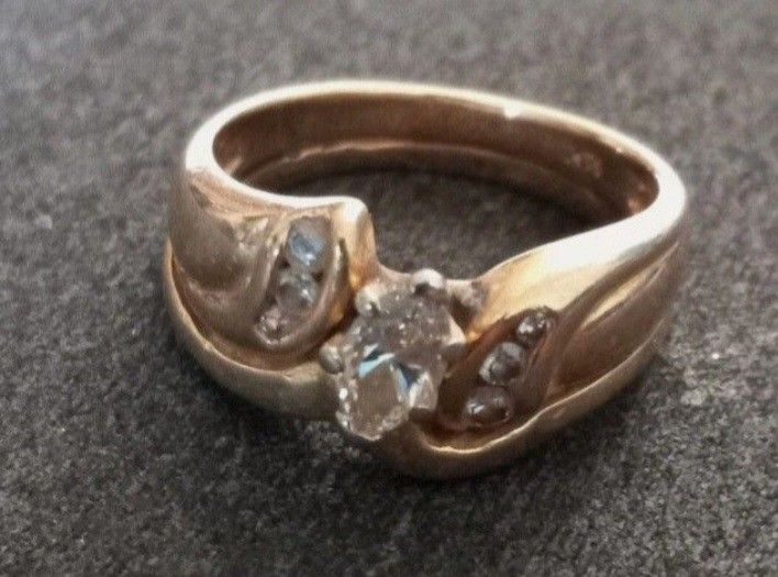 Vintage 14K Gold Diamond Wedding Ring Yellow 5.95 Grams .30 Carat Center Diamond with 6 side diamonds, 3 on each side. Rings used to be seperated but 
