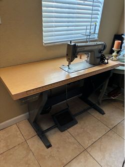 Singer 191D200A is a high-speed, straight-stitch industrial sewing machine