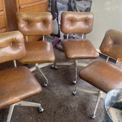 4 Rolling Chairs