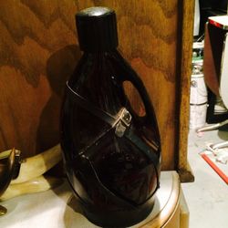 Antique leather bound liquor bottle
