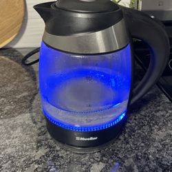 Electric kettle with speed boil tech