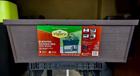 NEW  Vigoro
Brown Plastic Elevated Raised Garden Bed with Shelf (11.1 in. L x 32.3 in. W x 14.3 in. H)
