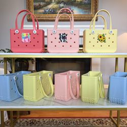 Brand New Small EVA Tote Bags in Fun, Trendy Colors. Comes with FREE pouch and FREE charm!