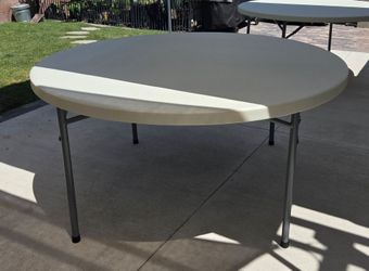 Brand New, in box, 60" round tables