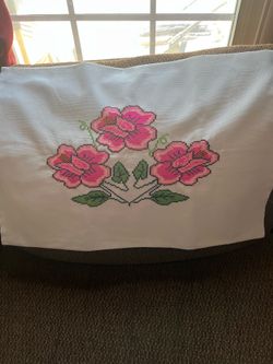 Almohadones de punto de cruz