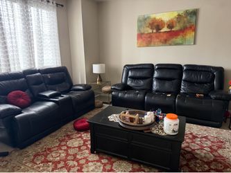 Black leather sofa and table
